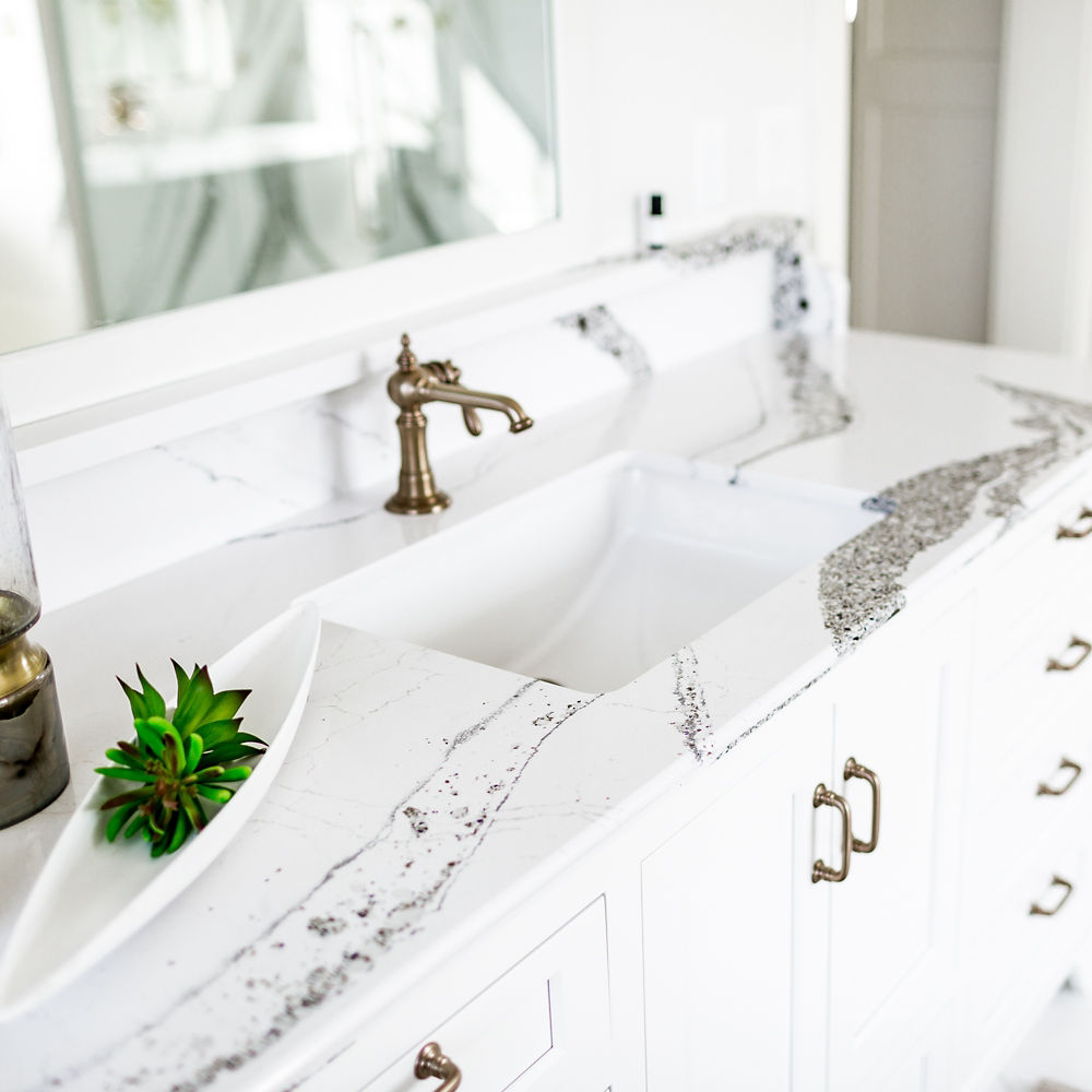 A bathroom vanity countertop featuring Cambria Annicca quartz.