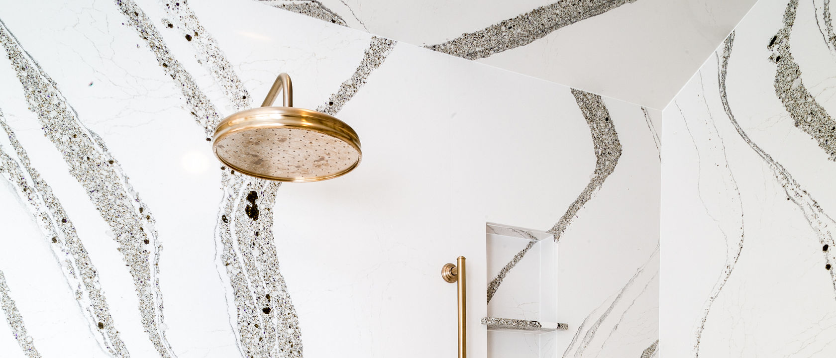 Interior view of shower with Cambria Annicca quartz shower walls