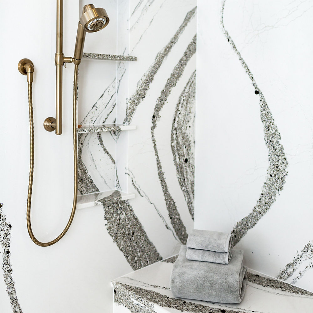 A shower with 300 square feet of Cambria Annicca quartz.