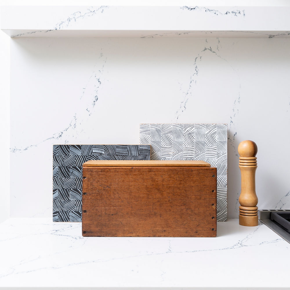 Natural tones provide texture and patina when juxtaposed with Cambria Archdale Matte elements.