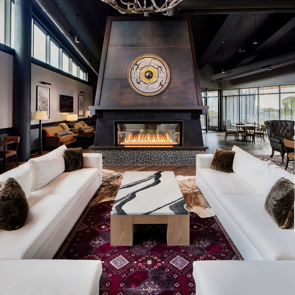 The Omni Viking Lakes Hotel lobby featuring a table with a Cambria Bentley quartz countertop.