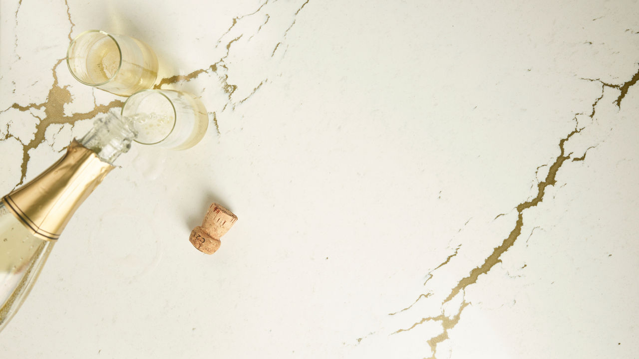 A countertop featuring a Cambria Berkshire Brass Sculpted quartz.