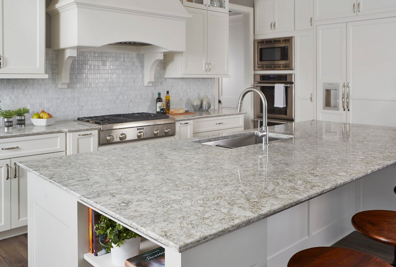 Light kitchen with tile backsplash featuring Berwyn Cambria quartz countertops