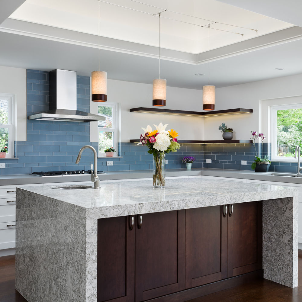 Transitional kitchen with Berwyn countertops and matte blue subway tile.