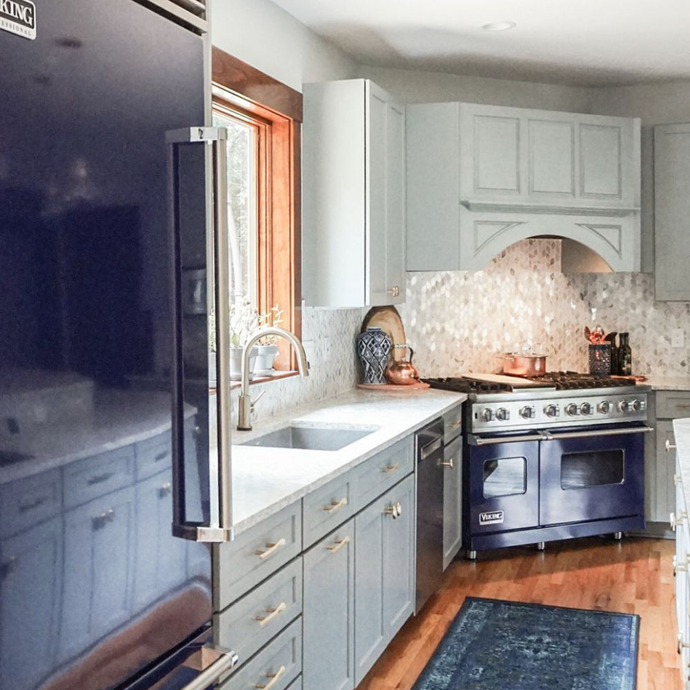 Beautiful Marble Kitchen Counter and Stove With Cobalt Blue Decor