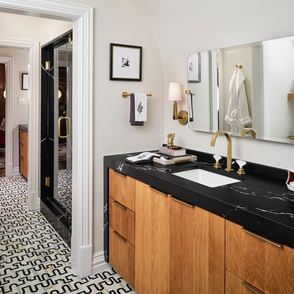 Bathroom vanity featuring a Cambria Blackbrook quartz countertop.