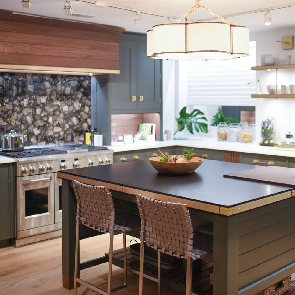 White and Black kitchen with floral accents and Blackpool Matte and White Cliff quartz countertops and island