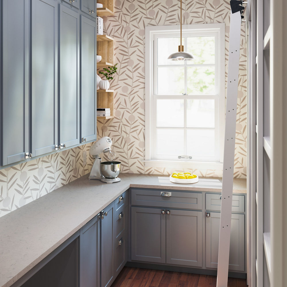A light-filled pantry with Cambria Bradwell quartz countertops.