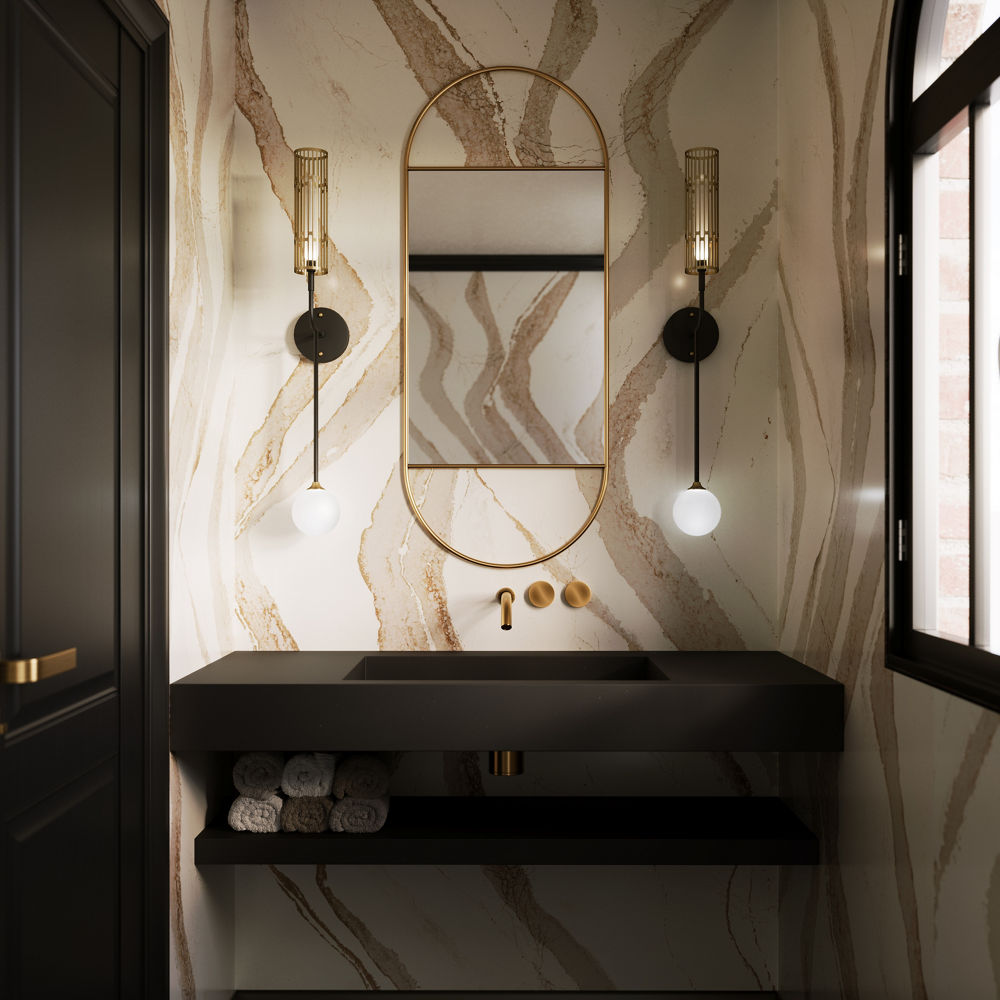 Bathroom with a black counter and Brittanicca Gold Cool quartz on the bathroom walls.