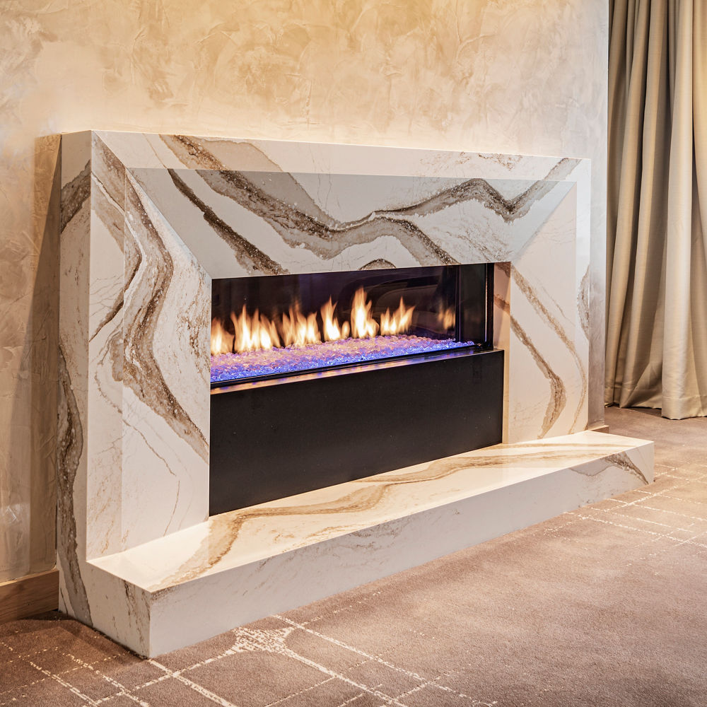 A Brittanicca Gold Warm fireplace surround