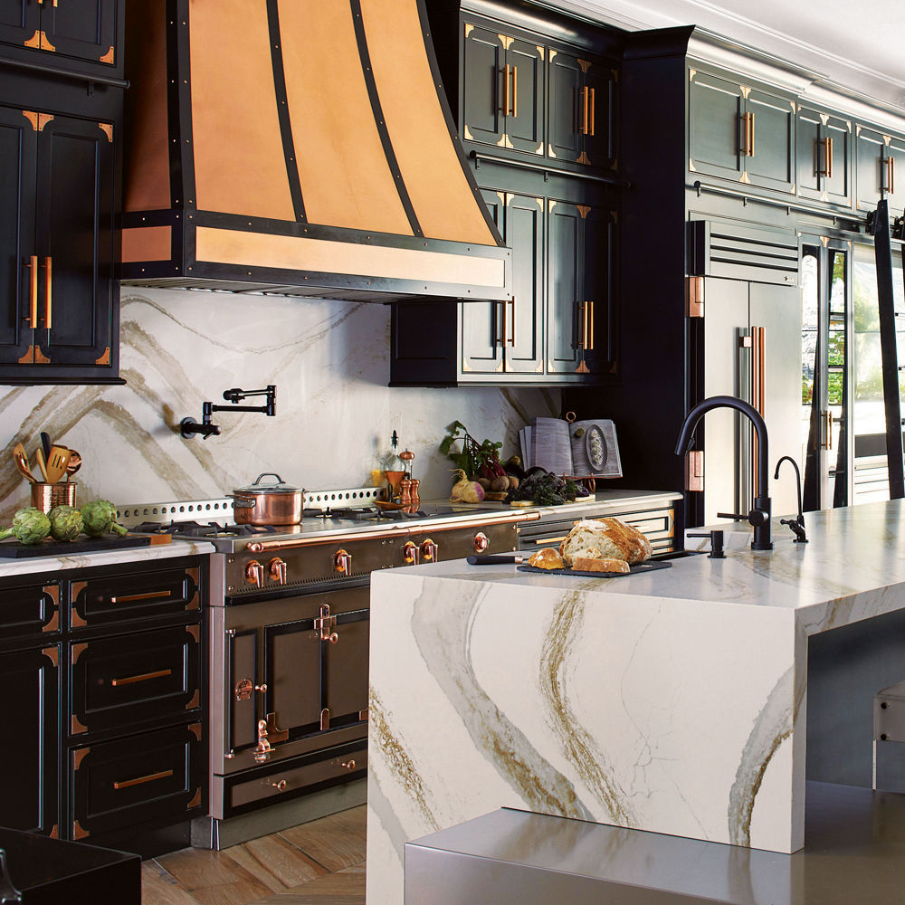 Cambria Brittanicca Gold Warm Matte quartz kitchen island countertop and backsplash in kitchen designed by Vanessa DeLeon