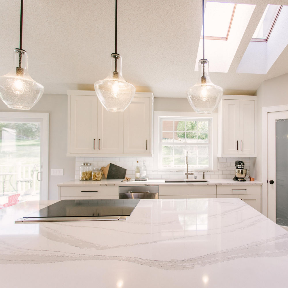 A bright white kitchen with Brittanicca quartz countertops 