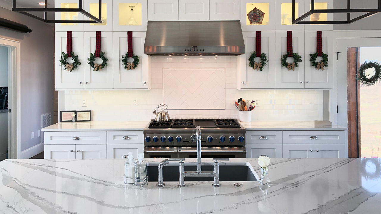 A kitchen with holiday decor and Brittanicca quartz countertops