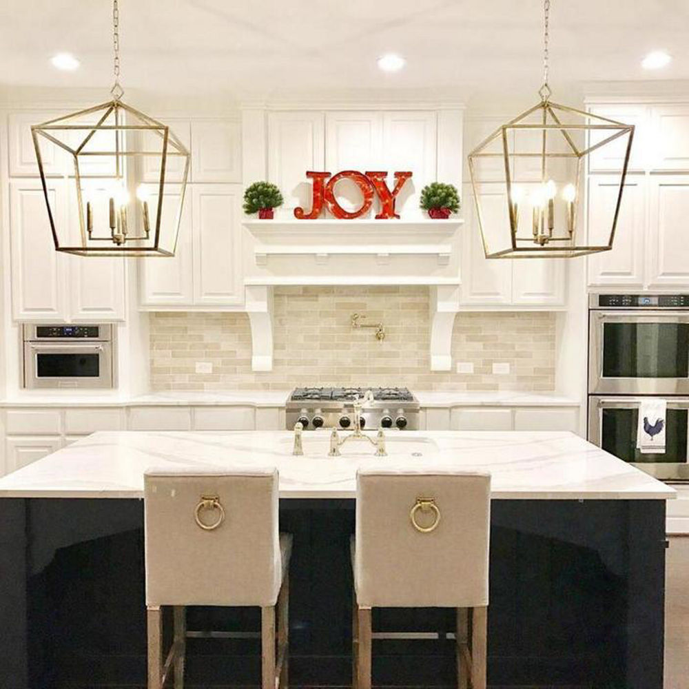 A bright white kitchen with Brittanicca quartz countertops 
