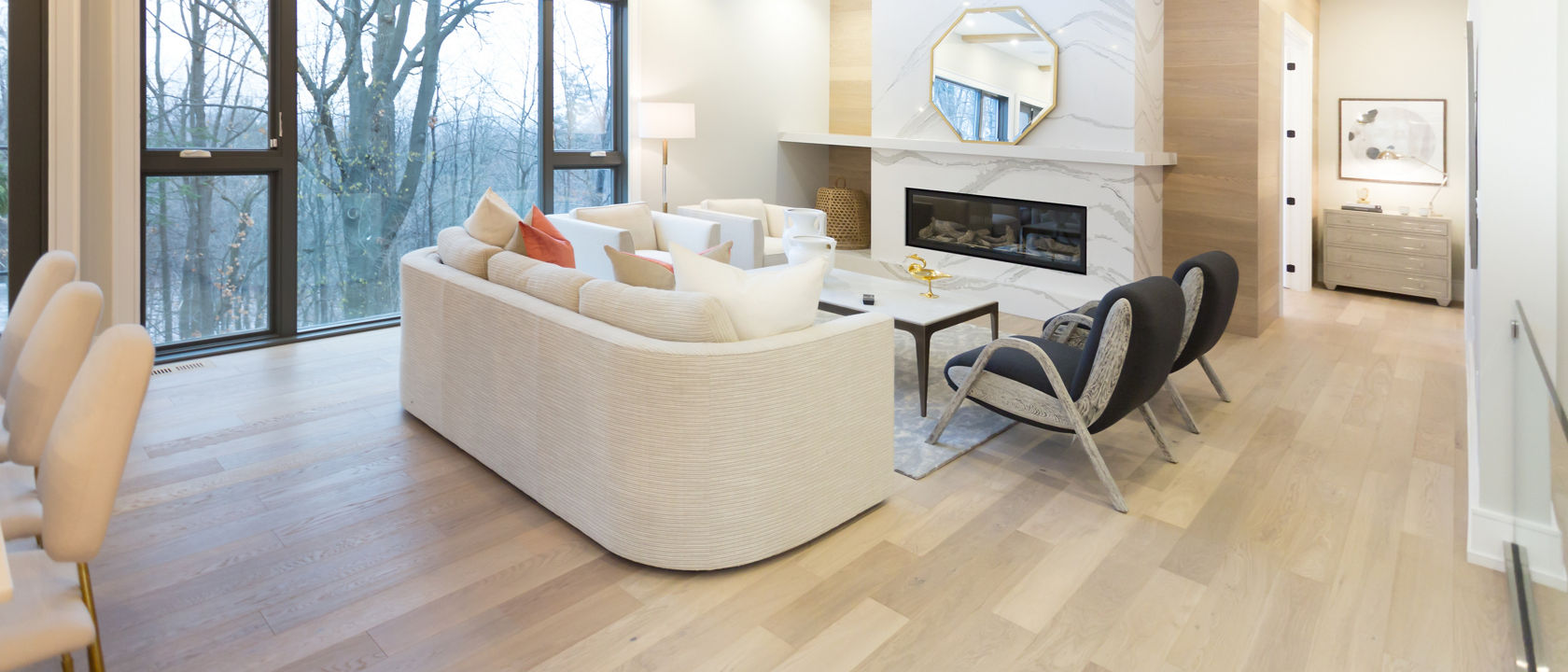 Cambria Brittanicca quartz full height fireplace surround in living room 