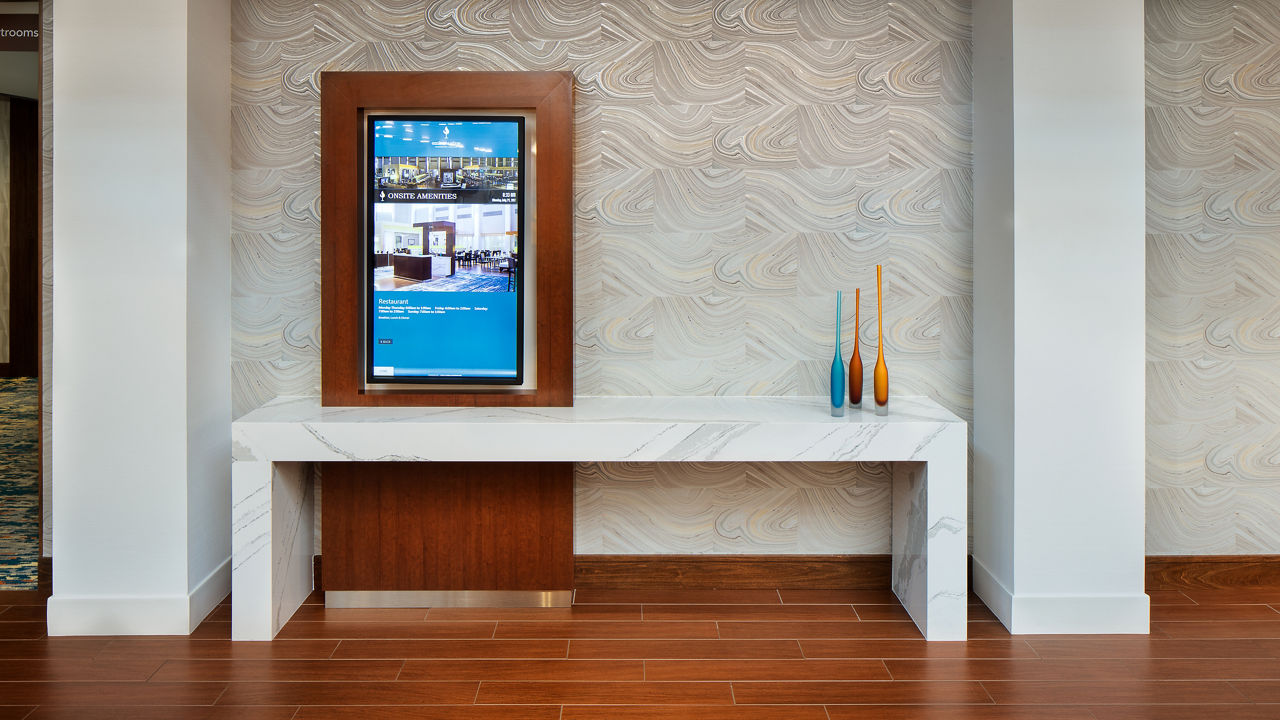 A lobby table at the Doubletree hotel made from Cambria Brittanicca™ quartz.