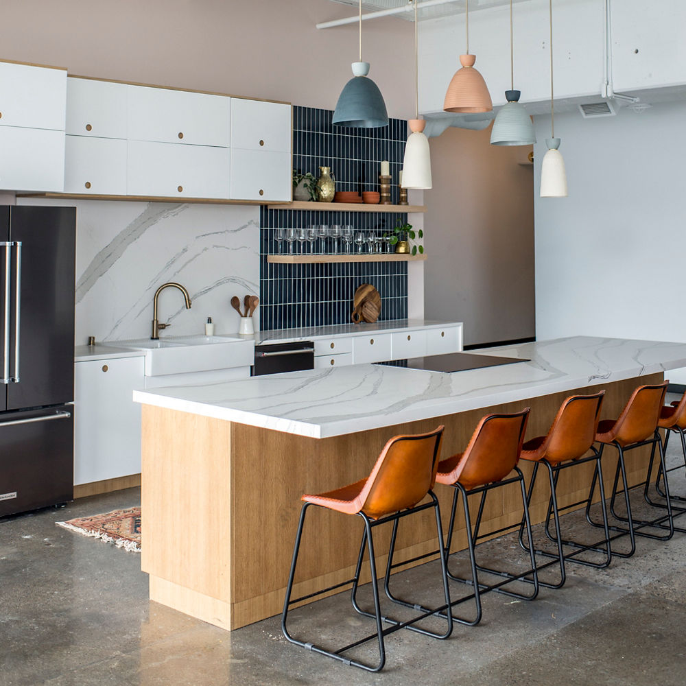 A modern breakroom featuring Cambria Brittanicca Matte quartz countertop and backsplash