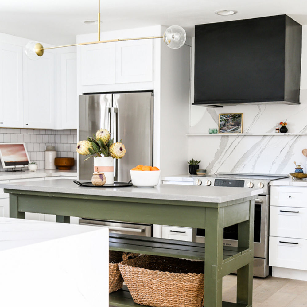 Cambria Carrick Matte™ quartz island countertops in a kitchen space.