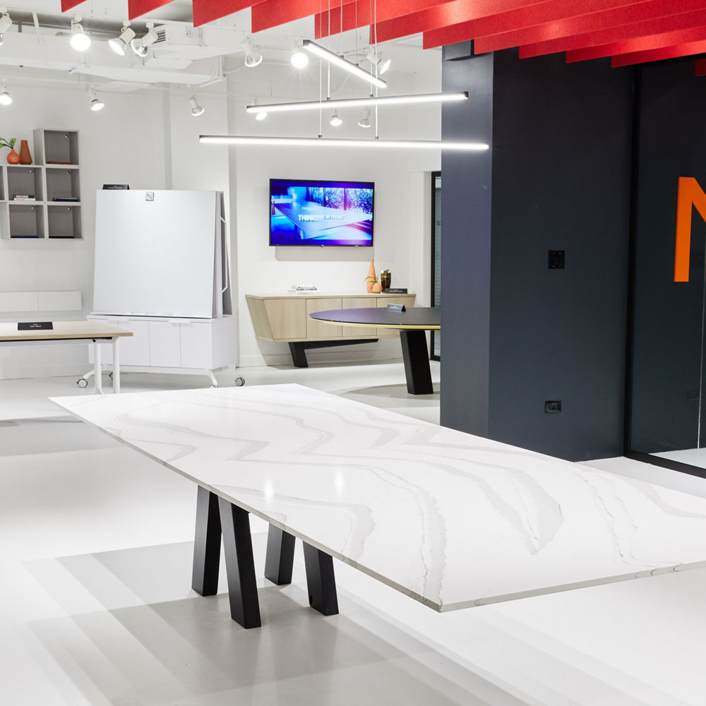 a unique table made from white quartz countertops