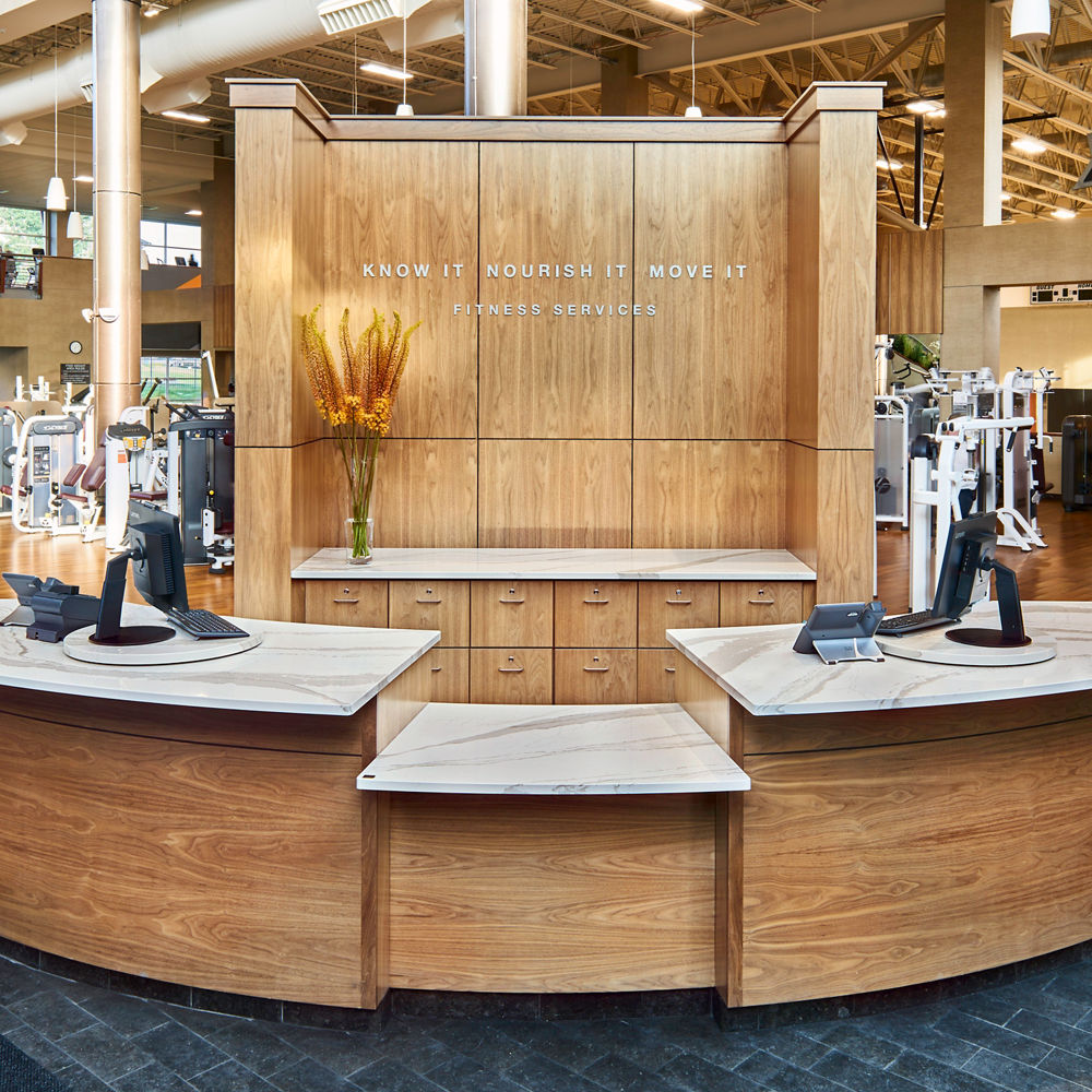 A Life Time Fitness reception desk in Flatirons, CO with Brittanicca quartz countertops