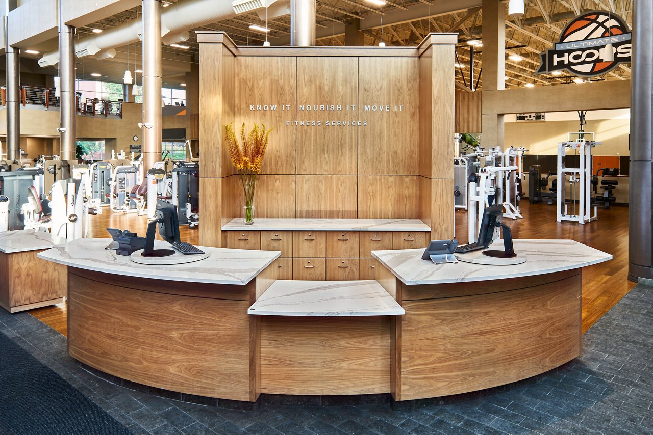 A Life Time Fitness reception desk in Flatirons, CO with Brittanicca quartz countertops