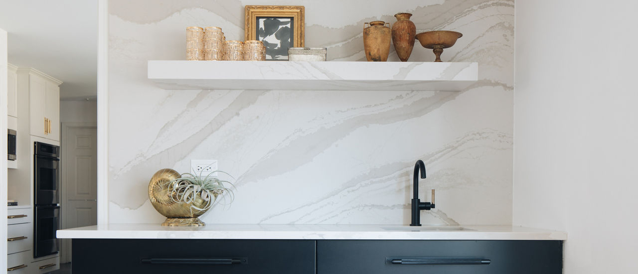 Cambria Brittanicca Warm Matte quartz on kitchen wall.