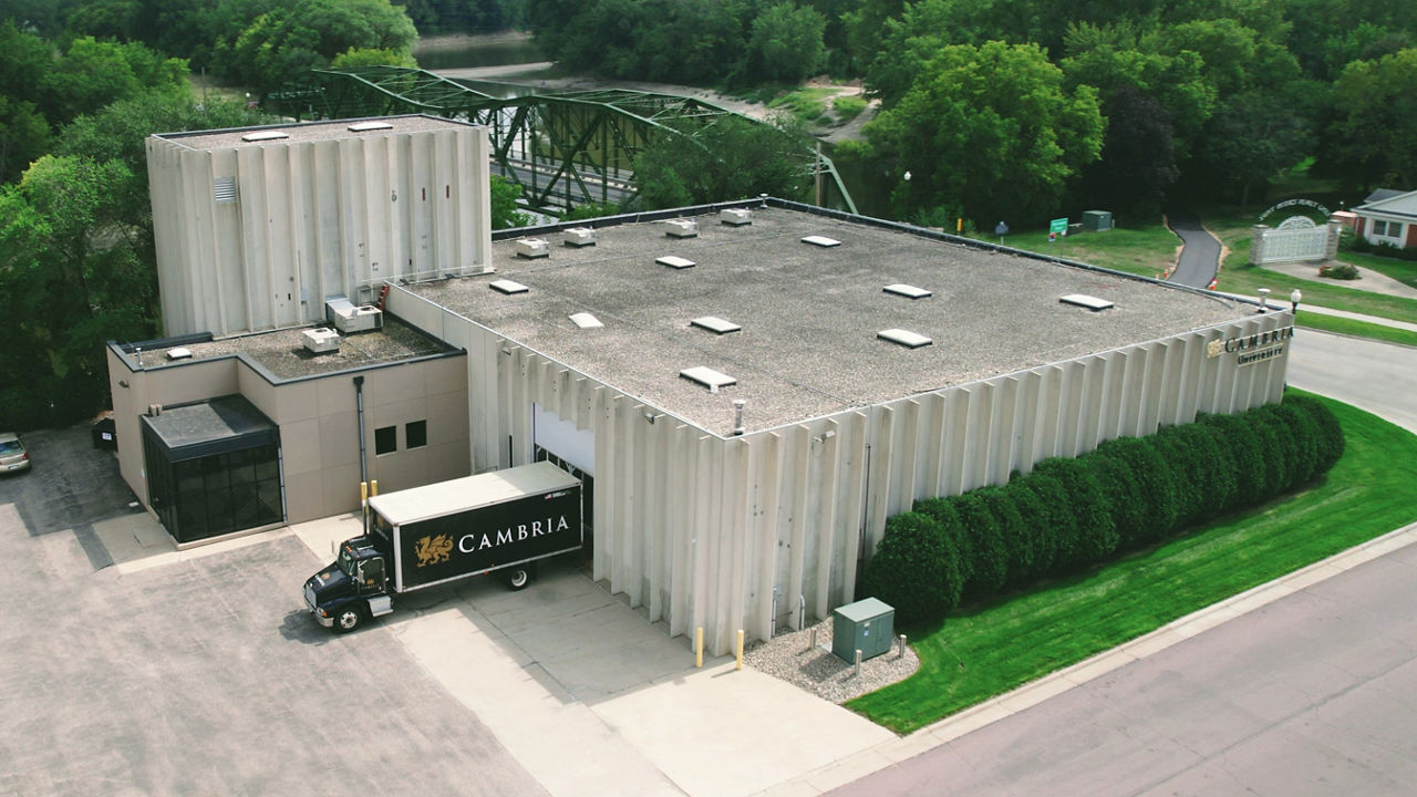 The back of Cambria University including a Cambria truck at the loading dock