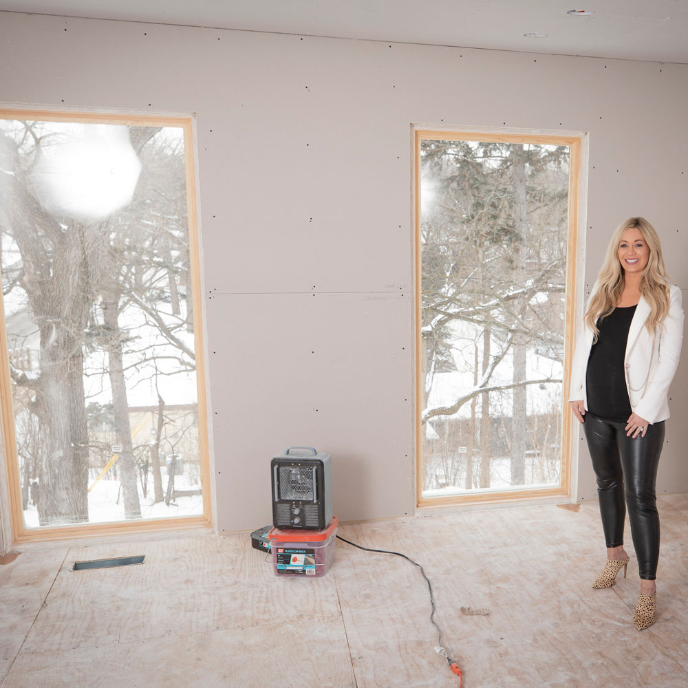 Closet during construction showing natural light.