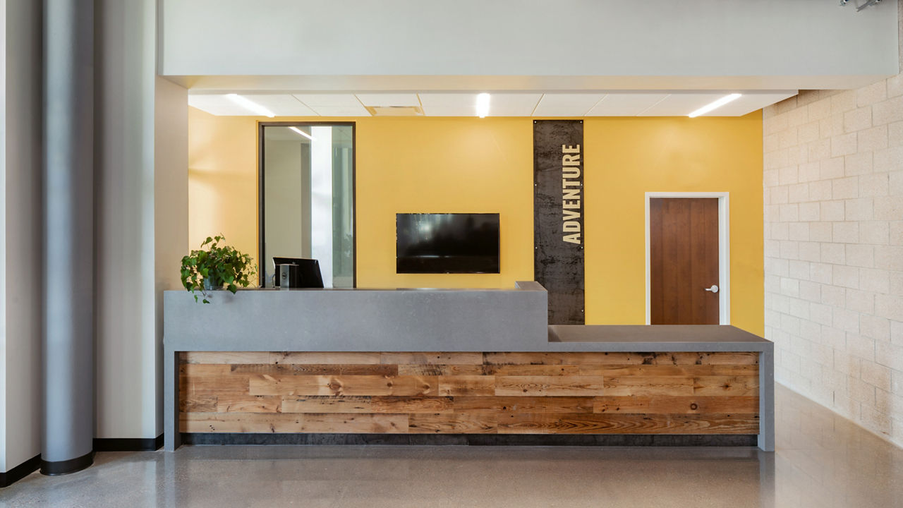 A lobby at the University of Denver with a Carrick quartz reception desk top