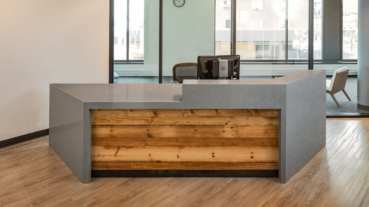 A reception desk at the University of Colorado with Carrick quartz countertops