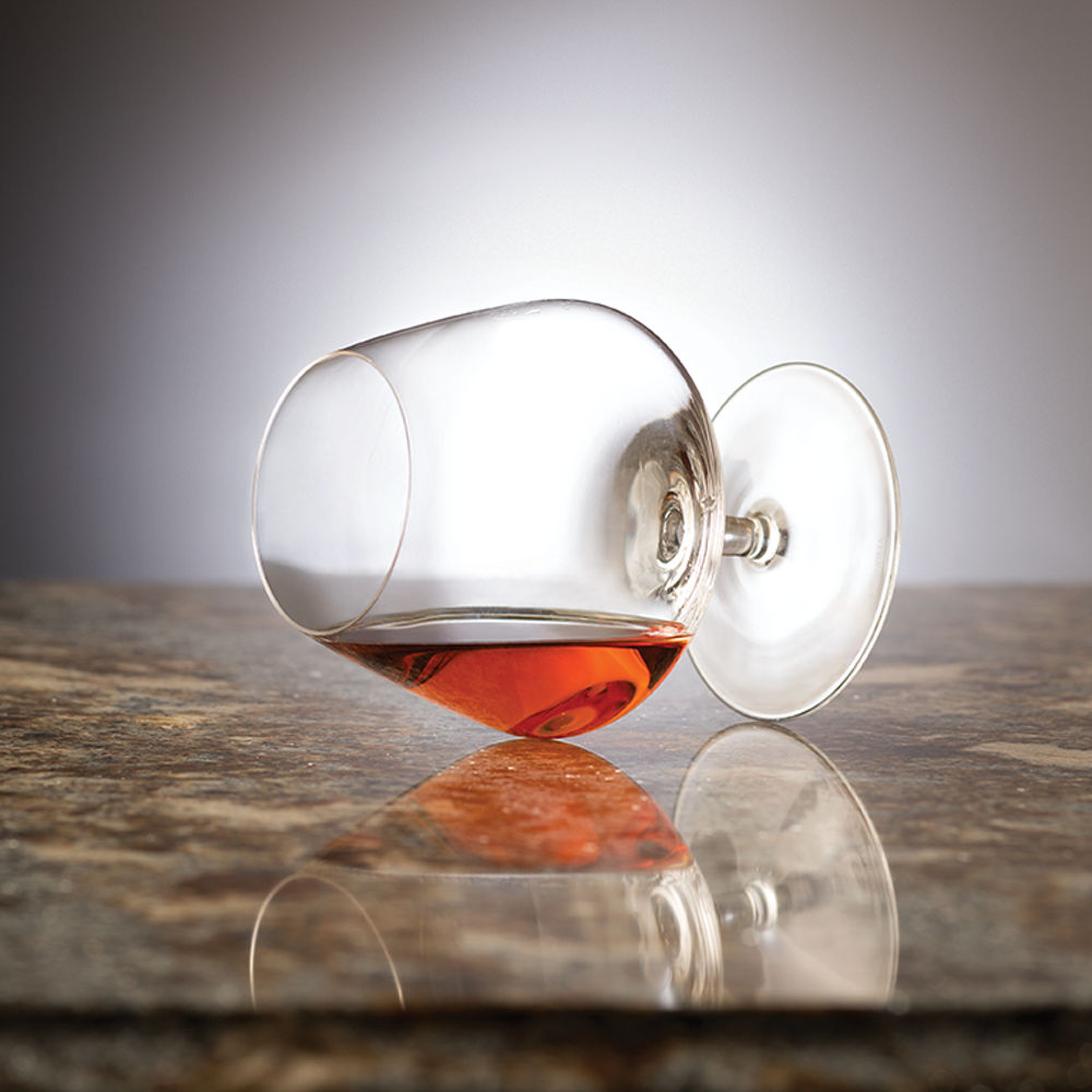 Glass of Brandy set against Cambria Helmsley.
