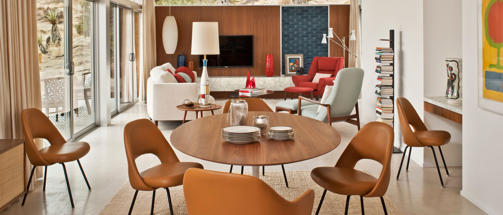 a mid-century modern dining room and living room.