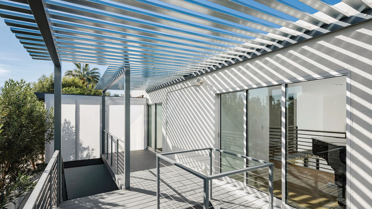 An outside patio of a modern house.