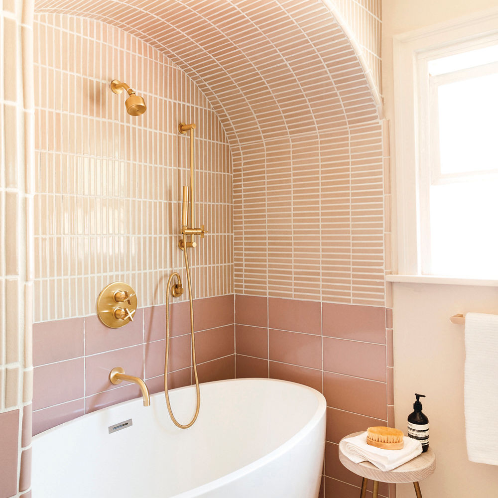 A fireclay tile alcove in a bathroom.