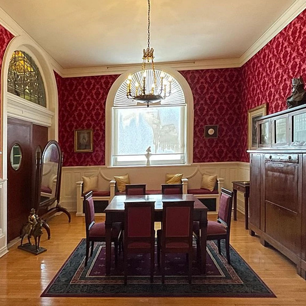 The Napoleon Bonaparte Room in New York’s Roswell P. Flower Memorial Library features appropriately French-inspired flocked wallpaper.