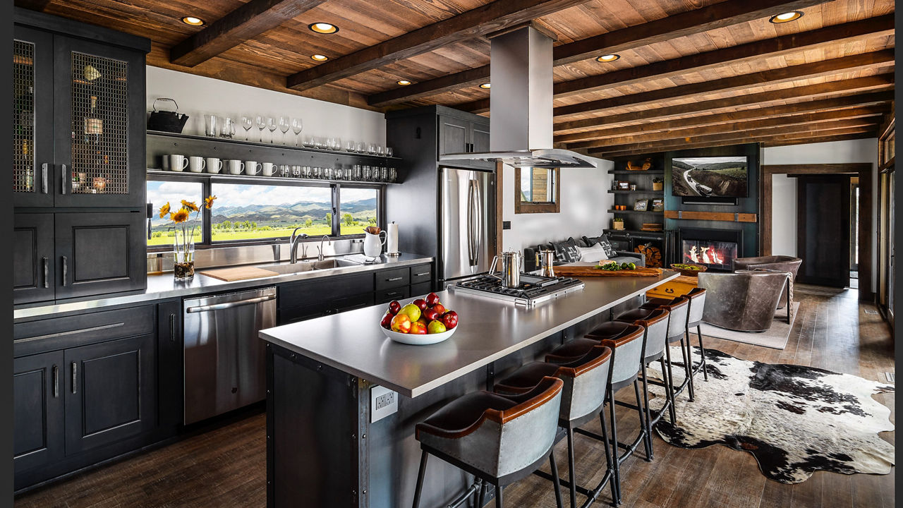 Cambria Devon Matte countertops in a stunning black and Oak kitchen design