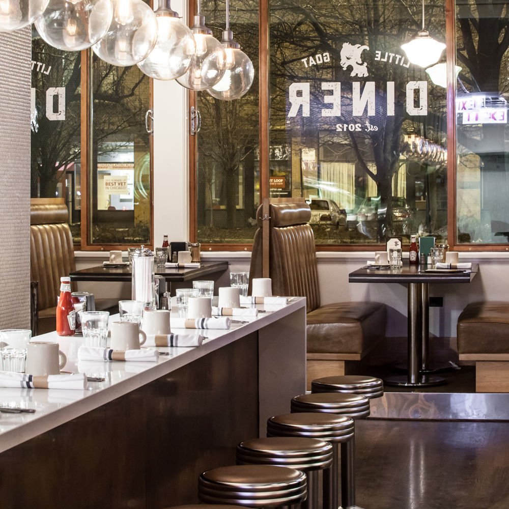 A diner with a bar counter featuring a Cambria Dovedale quartz countertop.