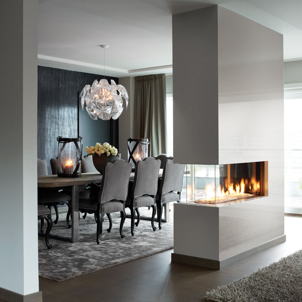Dining room with a gray Cambria Dunmore fireplace surround.