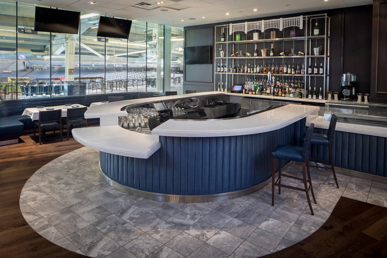 A bar at the Yankees Legends Suite Club with an Ella quartz bartop