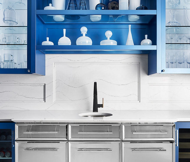 Blue and white Butlers pantry with Ella quartz countertops and backsplash