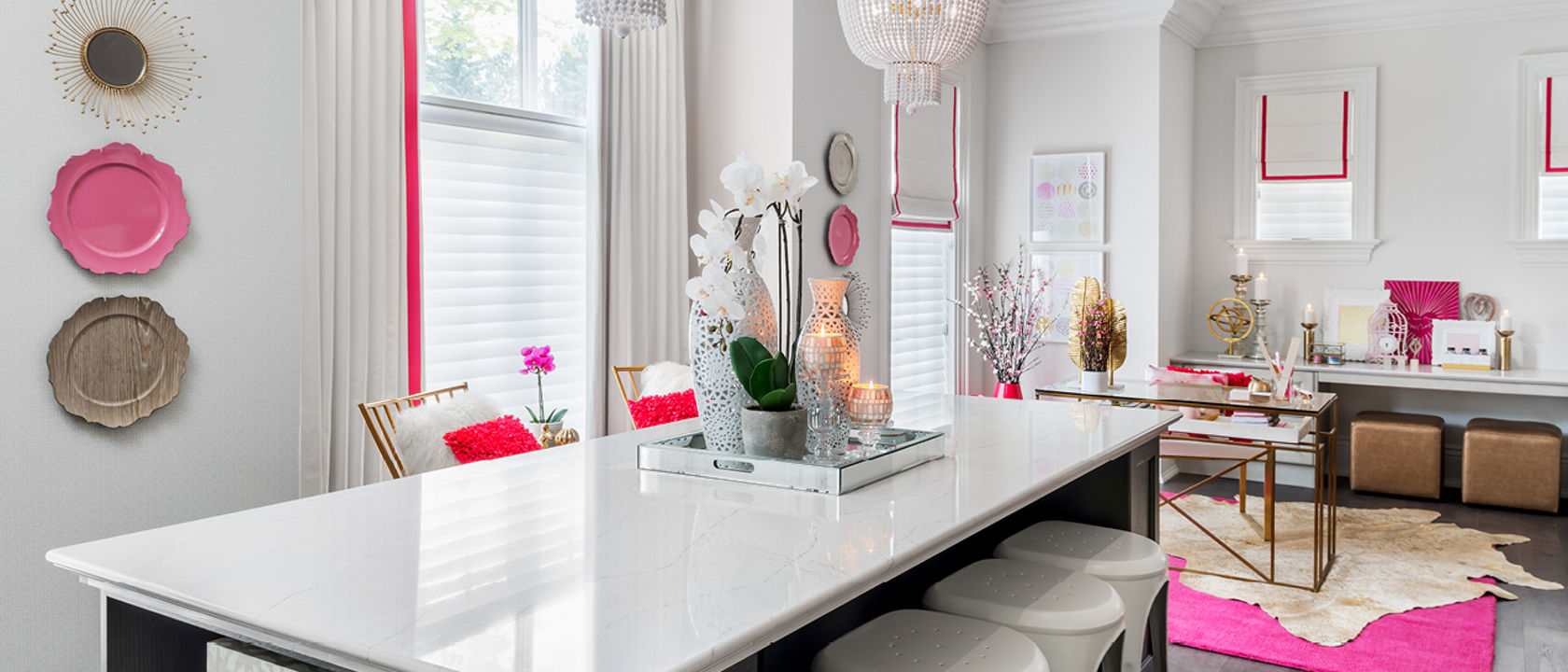 A stylish modern workspace with chandeliers and Cambria Ella quartz countertop