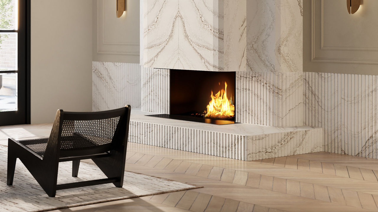 a modern fireplace made from white veined quartz.