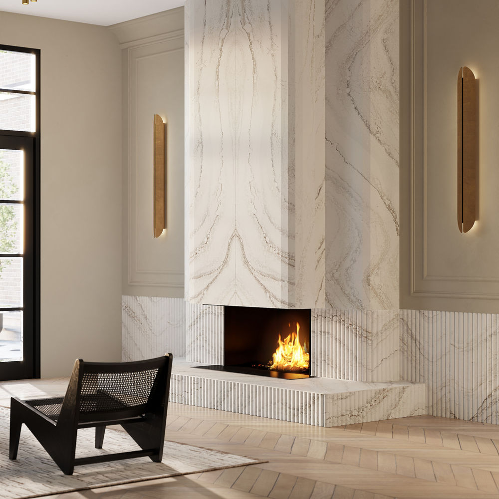 a modern fireplace made from white veined quartz.