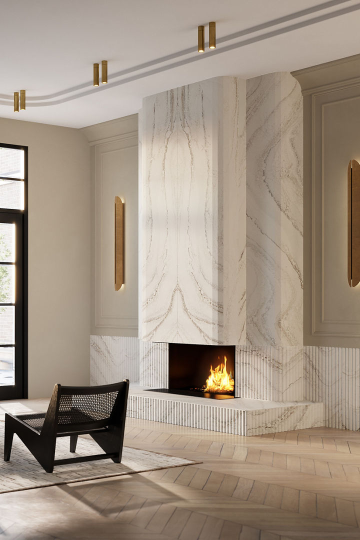 a modern fireplace made from white veined quartz.