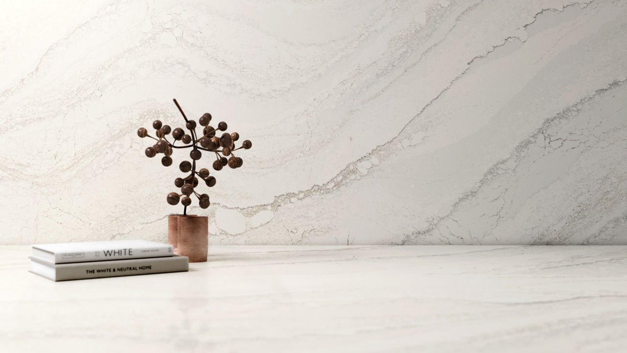 everleigh matte quartz with flowers and a stack of books