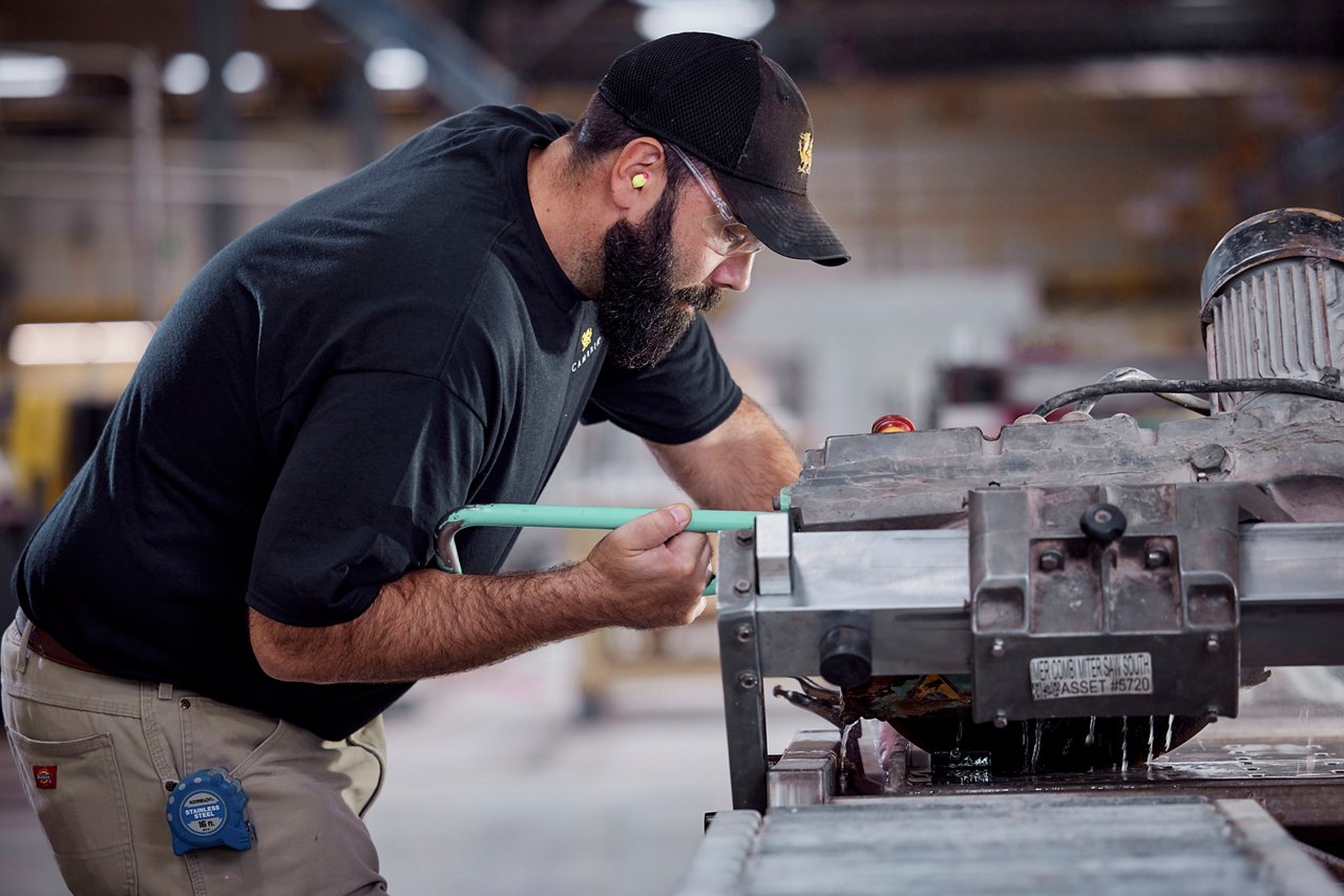 A man working at a fabricator shop.