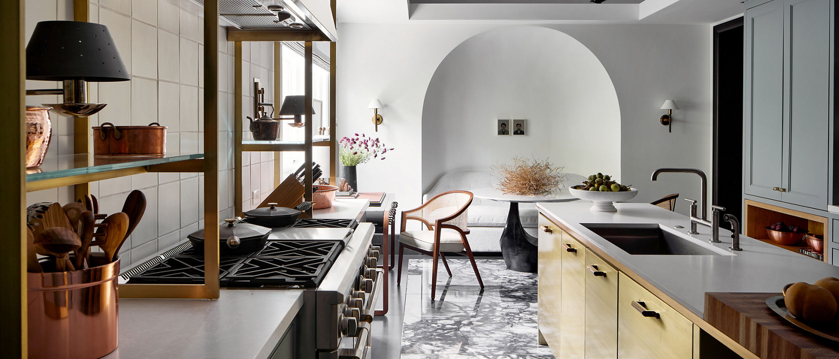 A beautiful copper and cream kitchen with Cambria Foggy City Matte quartz countertops