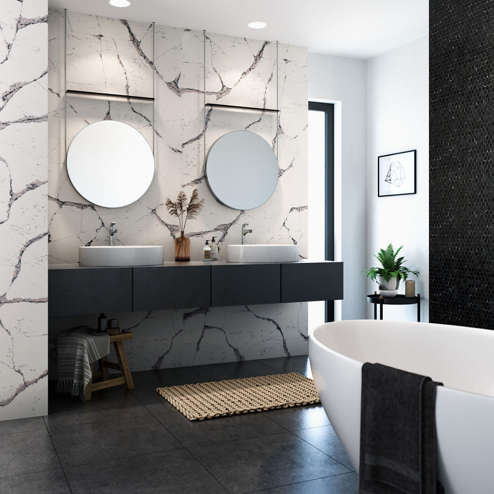 A bathroom with Cambria Harrogate quartz backdrop giving the bathroom a geometric look.
