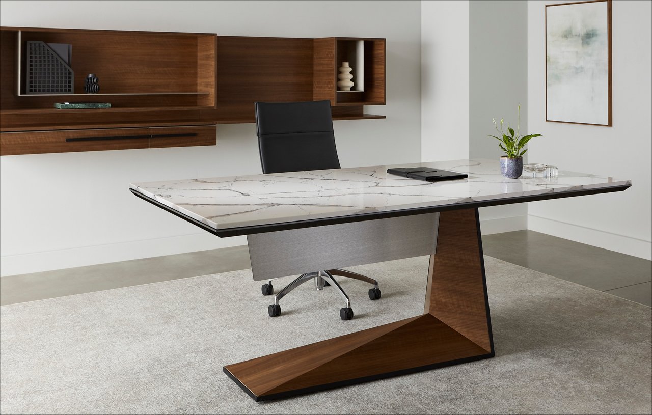 a unique, minamilistic desk topped with white and gray veined quartz slab. 