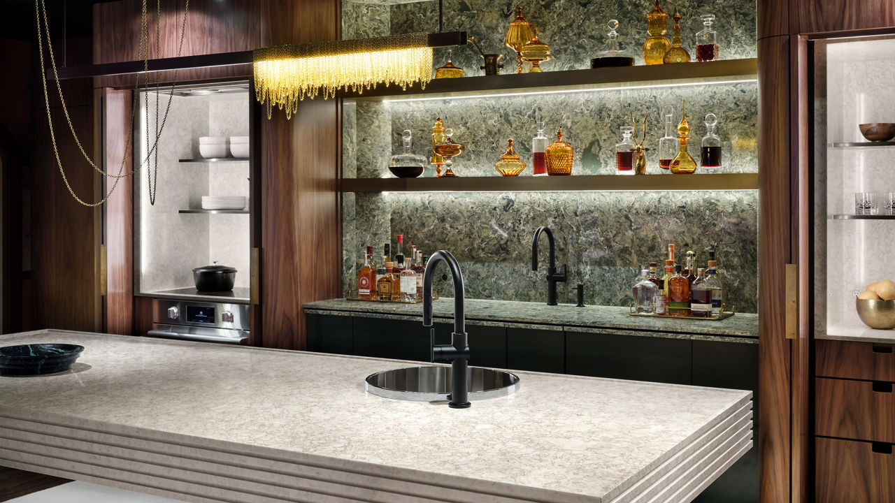 Unique Cambria Hermitage and Wentwood quartz bar countertop and backsplash